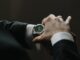 elegant green watch on businessman s wrist
