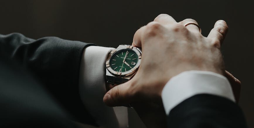 elegant green watch on businessman s wrist
